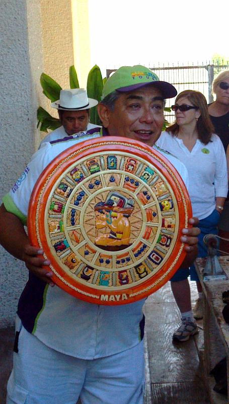 2013-01-22_10-07-59_280.jpg - Our tour guide, Carlos, showing us the Mayan Calendar